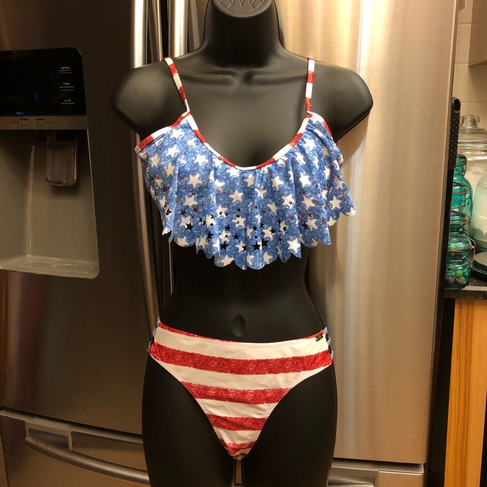 Heat Swimwear INC Brand 2 tops one bottom.